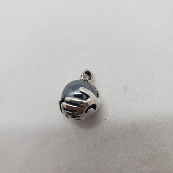 Hematite and Sterling Silver Hand Holding Moon and Star Pendant - Picture 2 of 4